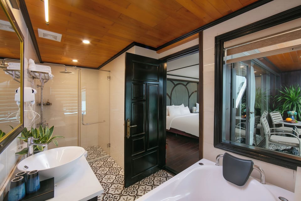 Junior Triple Room | Bathroom | Separate tub and shower, hydromassage showerhead, free toiletries
