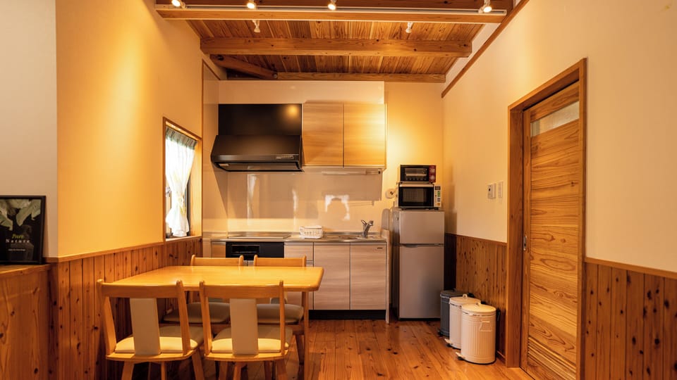 Basic Apartment | Private kitchen | Electric kettle, toaster, dining table