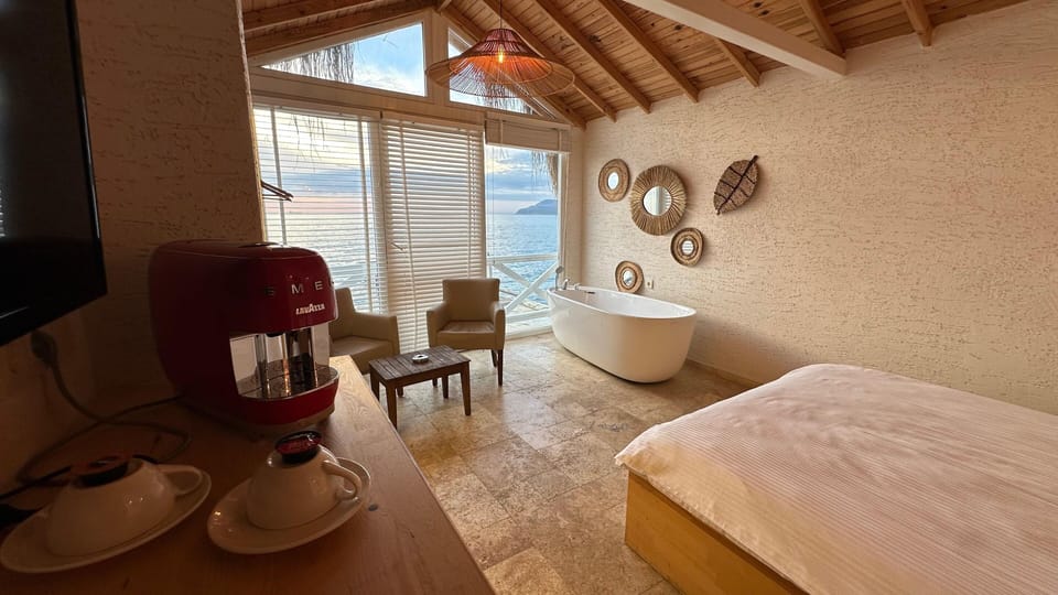 Premium Double Room, 1 Queen Bed, Bathtub, Sea View | Free minibar, individually furnished, desk, blackout drapes