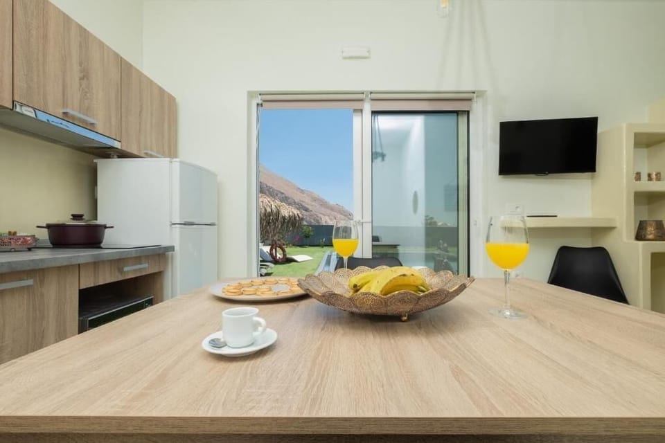 Luxury Villa | Private kitchen | Full-size fridge, espresso maker, coffee/tea maker, electric kettle