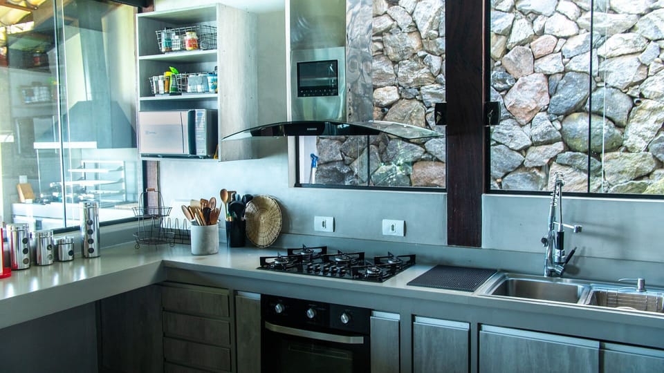 Villa | Private kitchen | Full-size fridge, microwave, oven, dishwasher