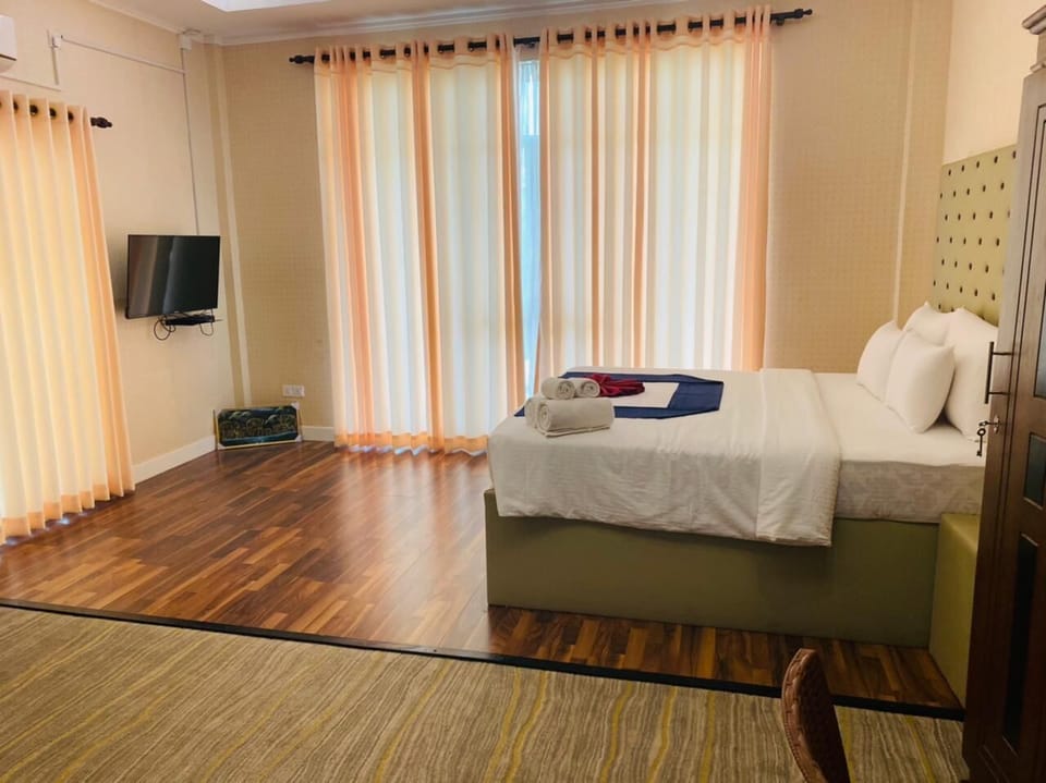 Deluxe Double Room | Premium bedding, desk, laptop workspace, iron/ironing board