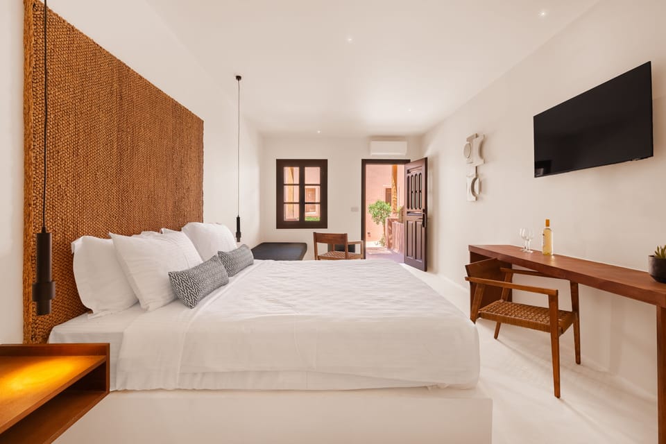 Premium bedding, down comforters, Select Comfort beds, minibar