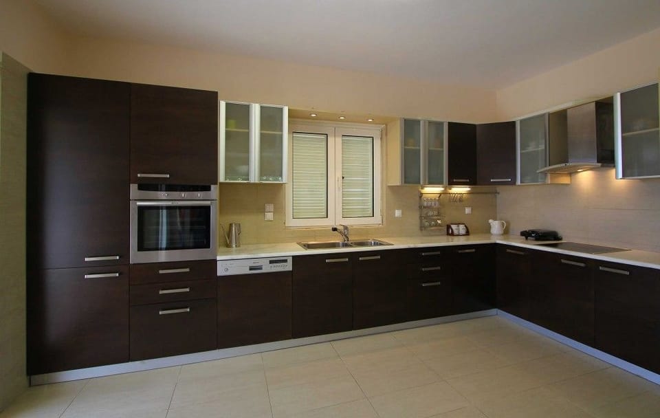 Villa | Private kitchen | Full-size fridge, microwave, stovetop, dishwasher