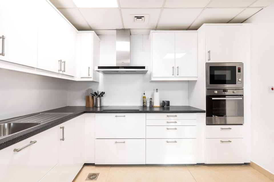 Exclusive Apartment, 3 Bedrooms, Sea View, Beachfront | Private kitchen | Full-size fridge, microwave, oven, stovetop