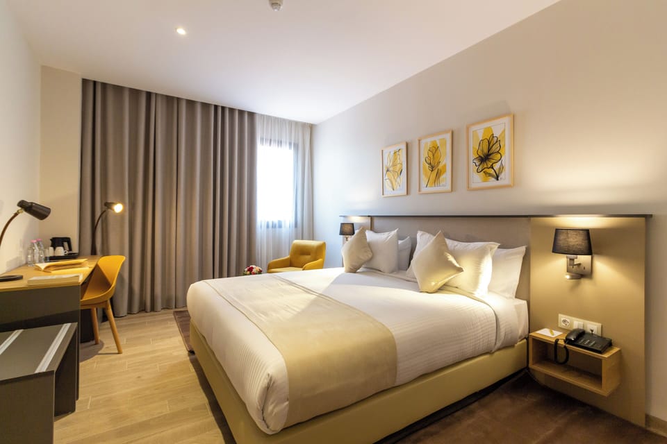 Select Comfort beds, minibar, in-room safe, desk