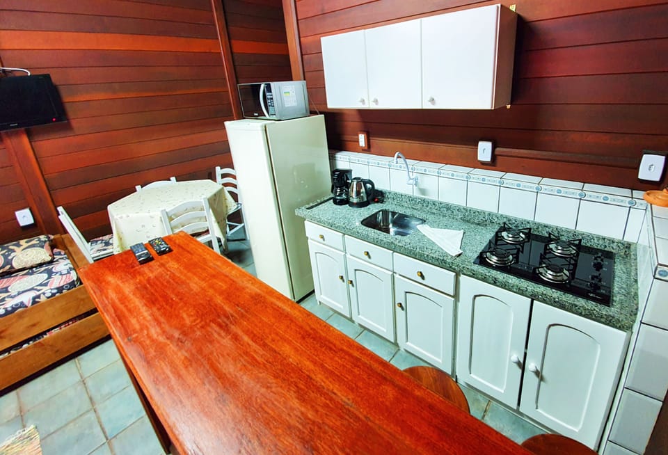Basic Chalet, 1 Bedroom, Smoking, Kitchen | Private kitchen | Shared fridge, microwave