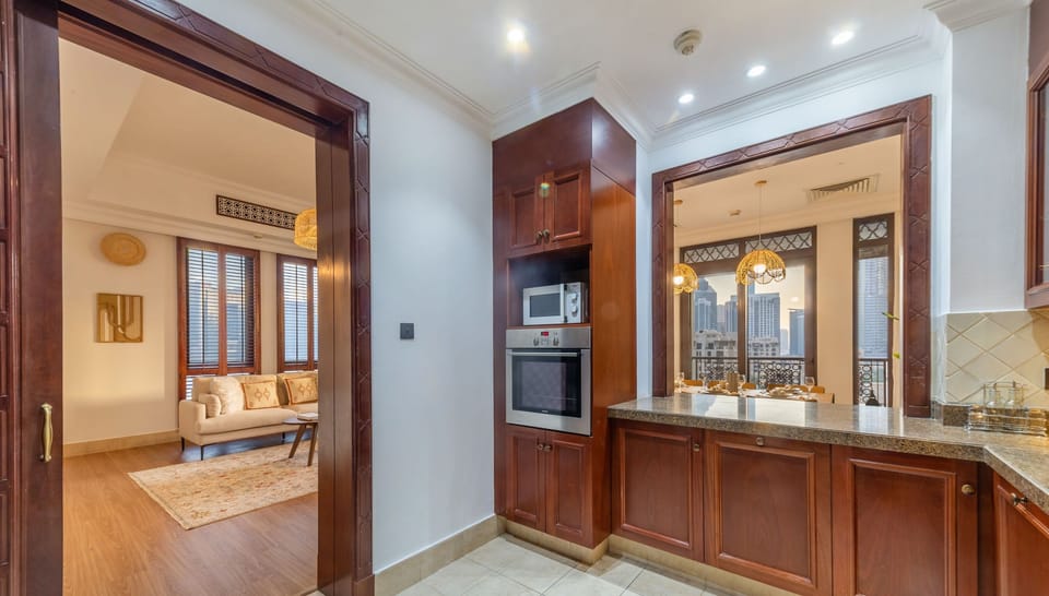 Luxury Apartment | Private kitchen | Fridge, microwave, cleaning supplies, paper towels