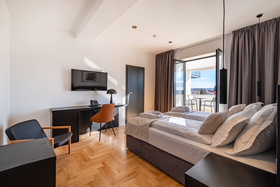 Twin Room with Balcony | 1 bedroom, minibar, in-room safe, desk