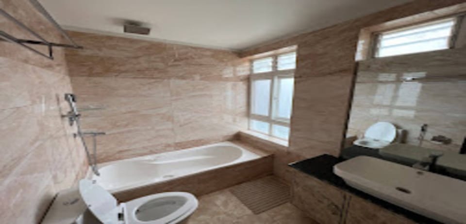 Shower, rainfall showerhead, towels, soap