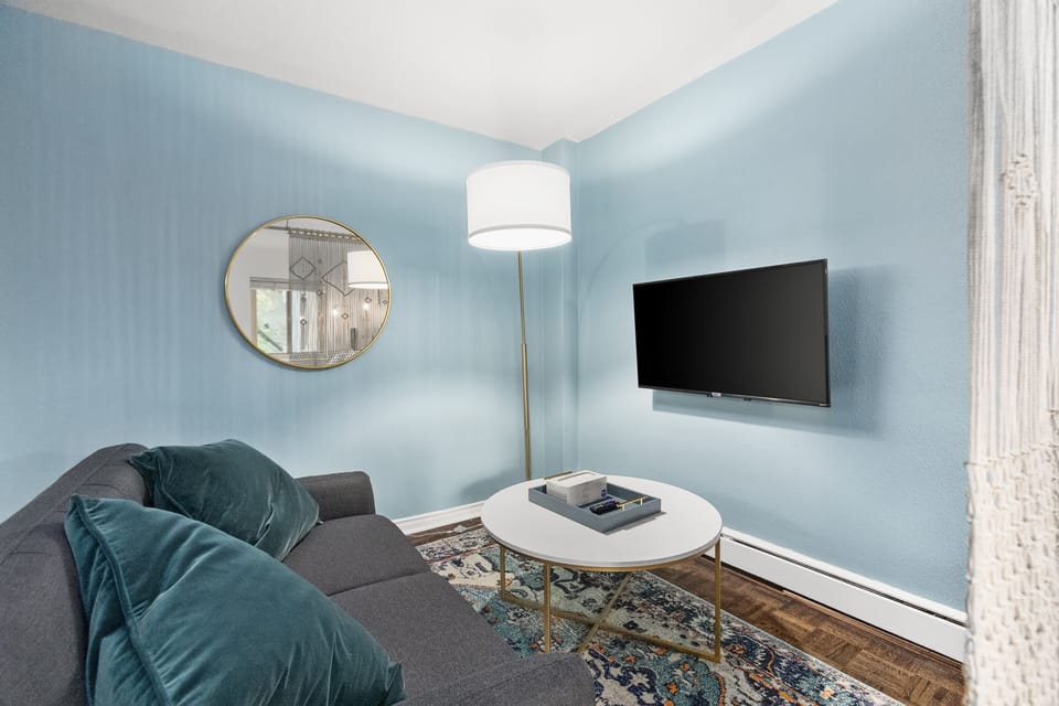 Classic Apartment | Living area | 40-inch TV with digital channels