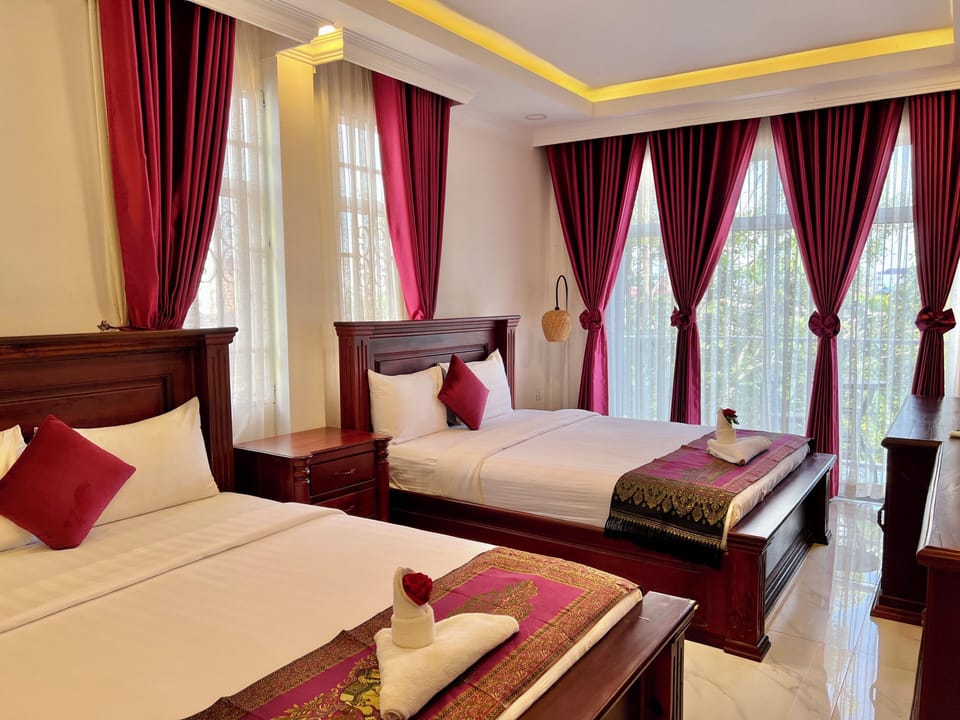 Deluxe Twin Room, 2 Queen Beds | Desk, laptop workspace, blackout drapes, WiFi (free)