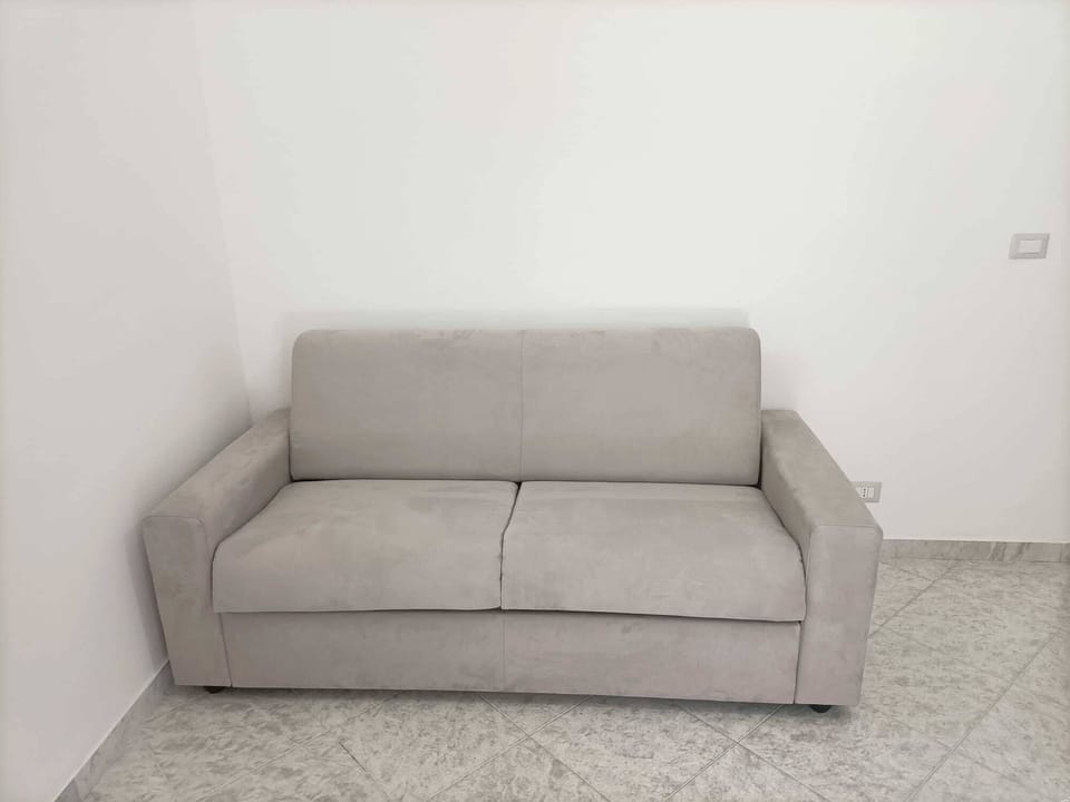 Comfort Apartment | Living area | Flat-screen TV