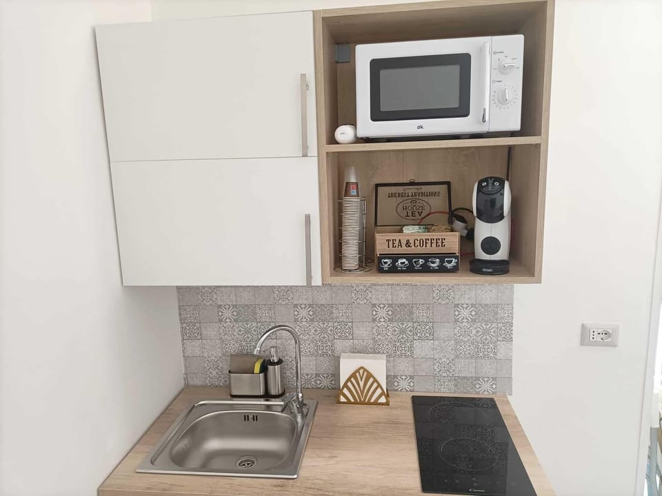Comfort Apartment | Private kitchen | Full-size fridge, microwave, stovetop, electric kettle
