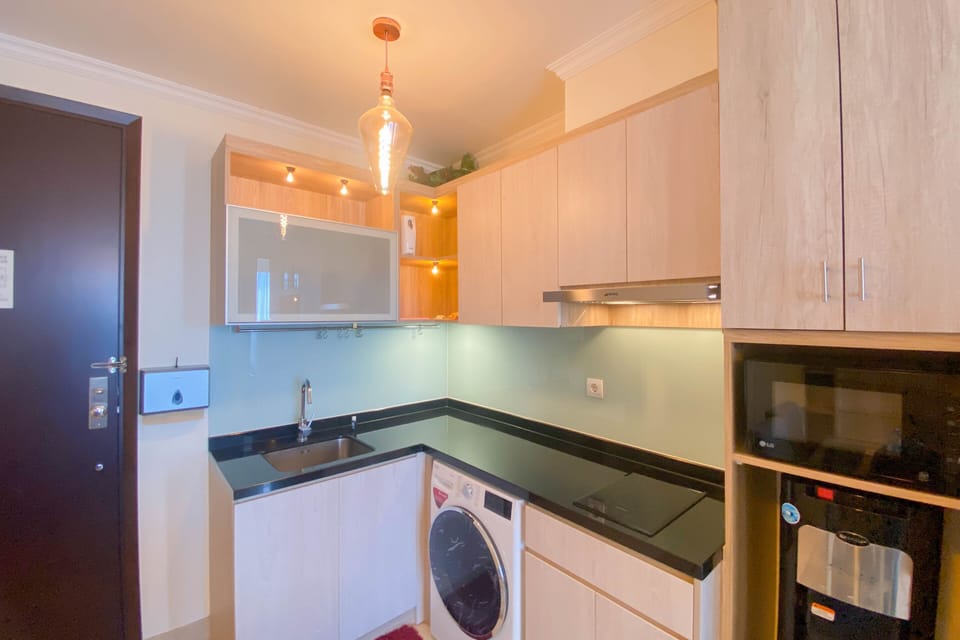Apartment | Private kitchen | Full-size fridge, stovetop, rice cooker, cookware/dishes/utensils