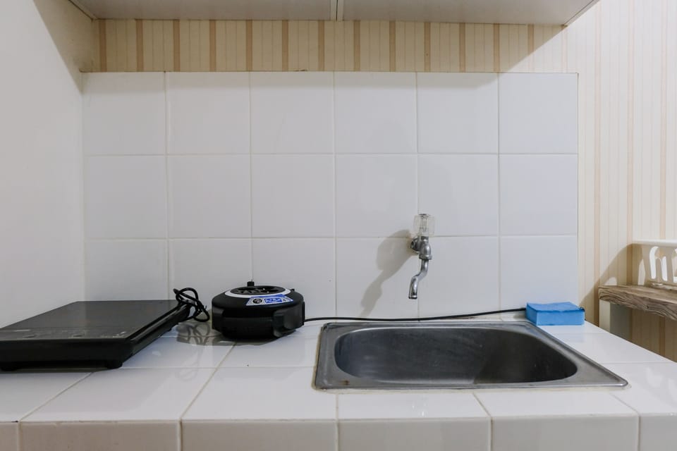 Apartment | Private kitchen | Full-size fridge, stovetop, rice cooker, cookware/dishes/utensils