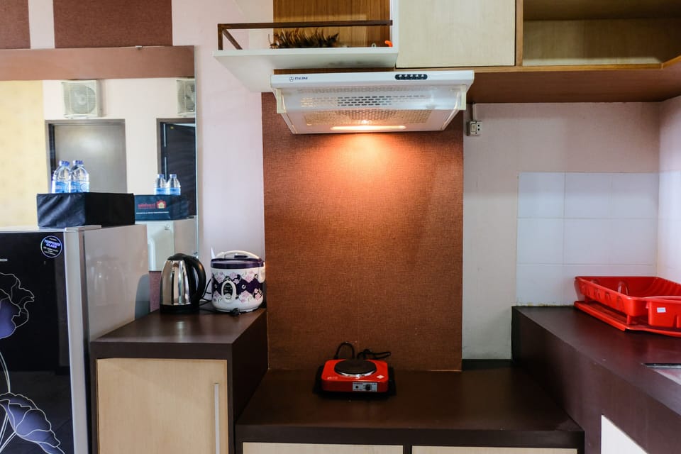 Apartment | Private kitchen | Full-size fridge, stovetop, rice cooker, cookware/dishes/utensils