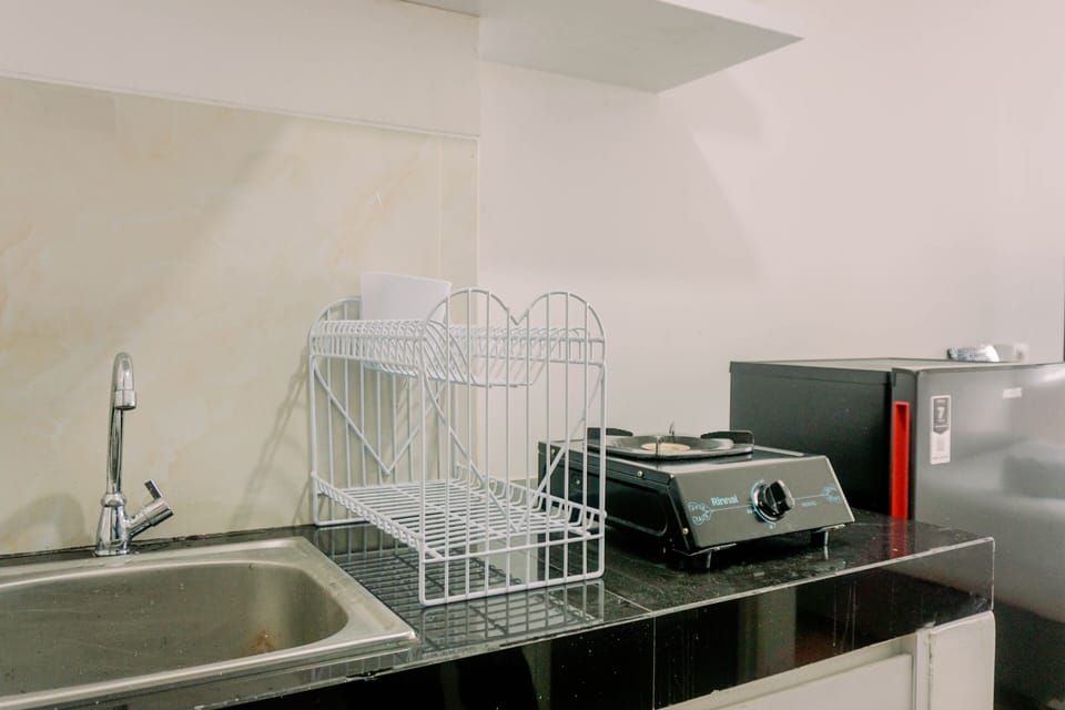Apartment | Private kitchen | Full-size fridge, stovetop, rice cooker, cookware/dishes/utensils