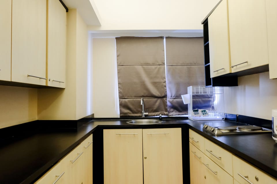 Apartment | Private kitchen | Full-size fridge, stovetop, rice cooker, cookware/dishes/utensils
