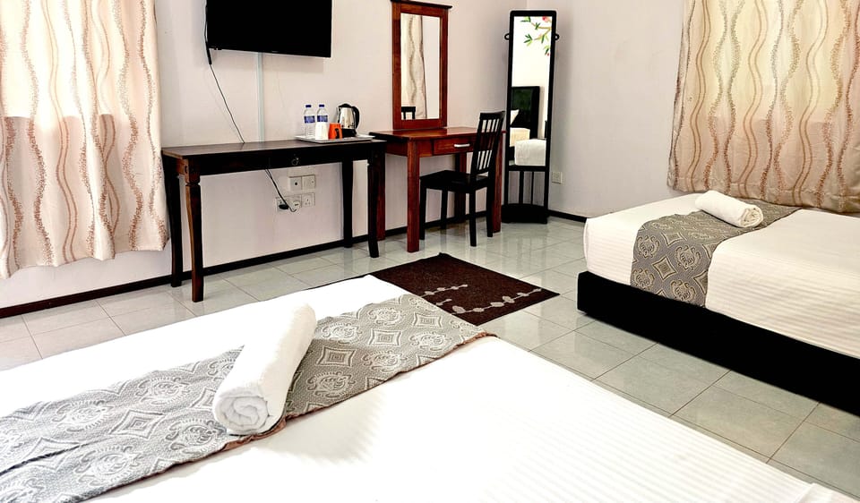 Standard Twin Room | Individually decorated, desk, laptop workspace, blackout drapes
