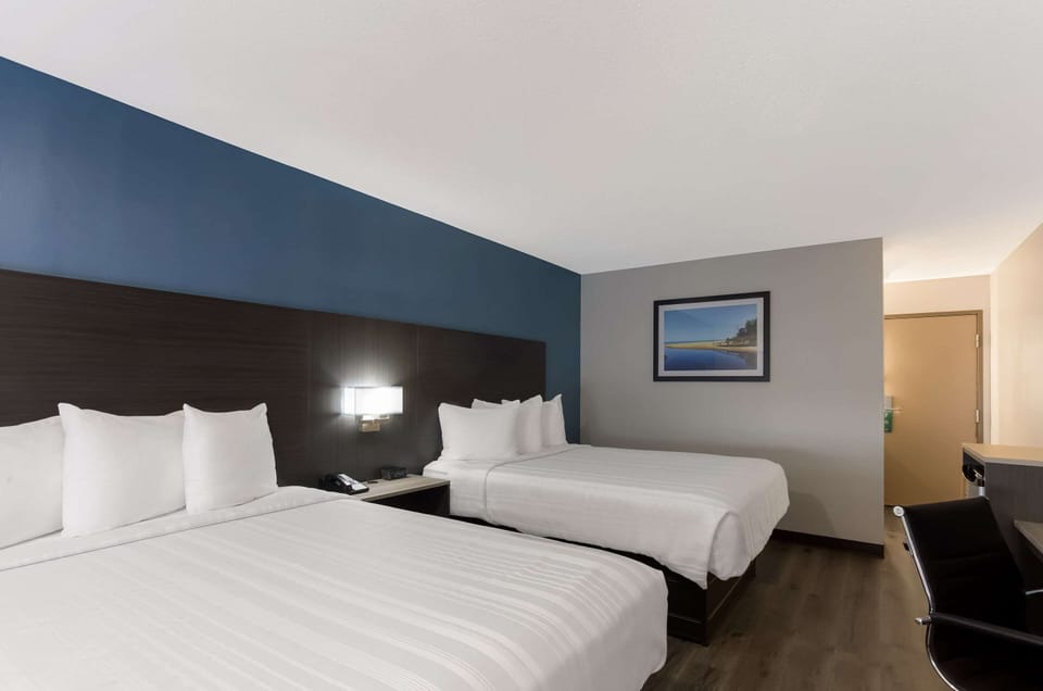 Standard Double Room, 2 Queen Beds, Non Smoking | Pillowtop beds, individually decorated, individually furnished, desk