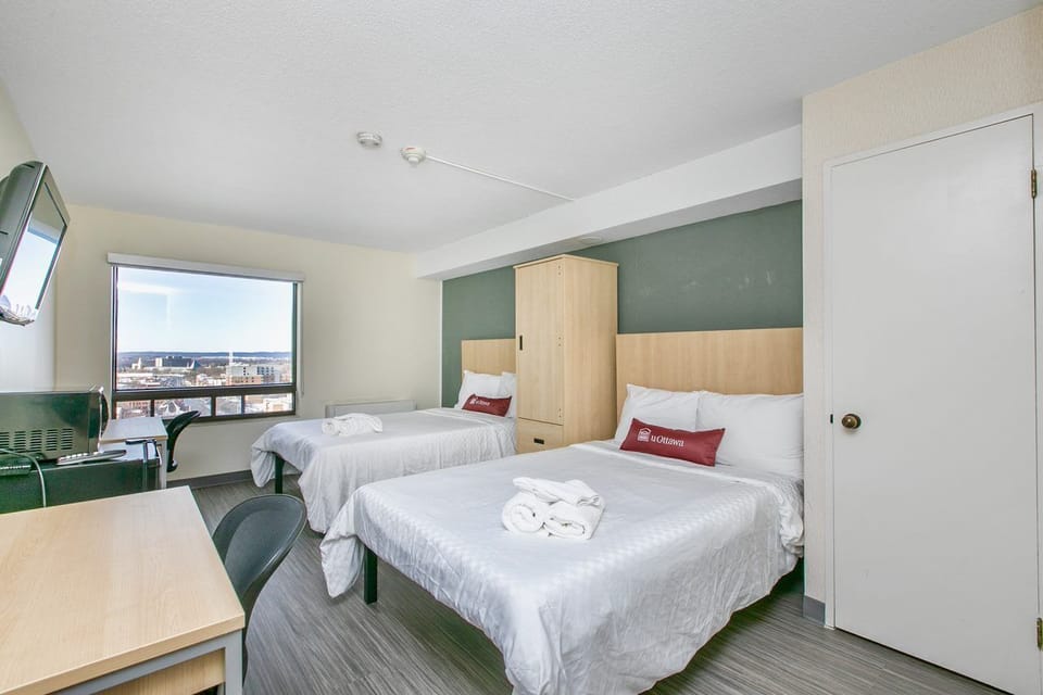 Economy Room, 2 Double Beds | Free WiFi, bed sheets