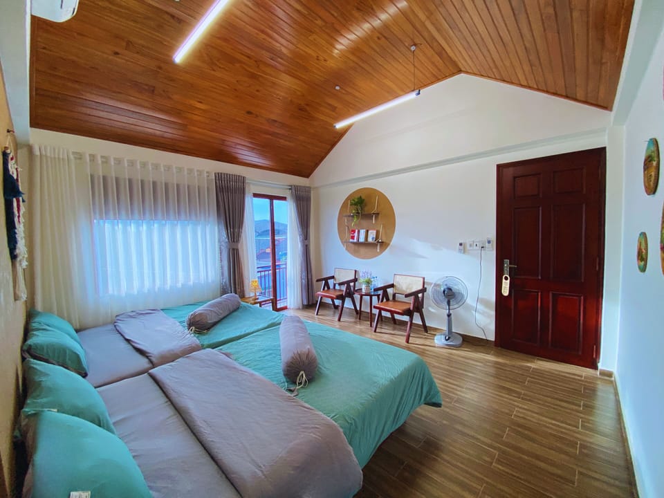 Deluxe Quadruple Room, Multiple Beds | Soundproofing, iron/ironing board, free WiFi, bed sheets