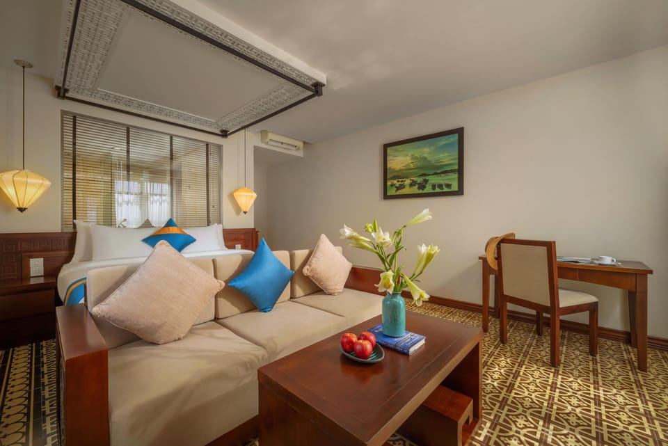 Junior Double Room, Non Smoking, River View | Minibar, in-room safe, desk, laptop workspace