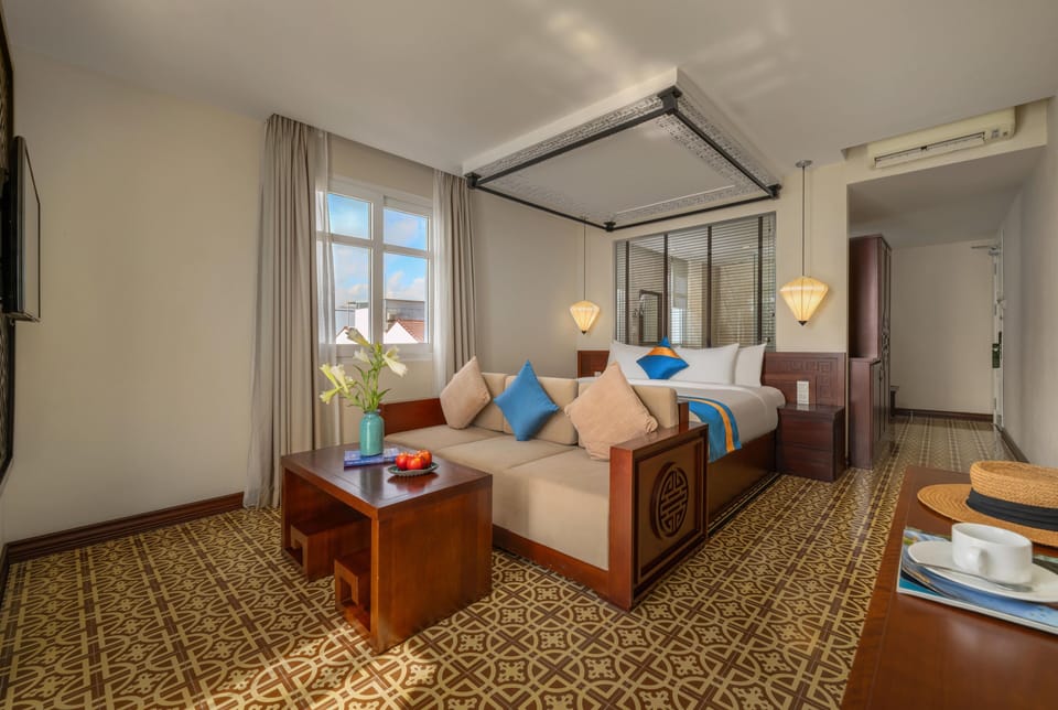 Junior Double Room, Non Smoking, River View | Minibar, in-room safe, desk, laptop workspace
