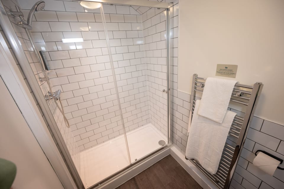 Family Room | Desk, blackout drapes, iron/ironing board, free WiFi