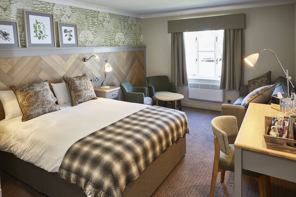 Family Room | Desk, blackout drapes, iron/ironing board, free WiFi