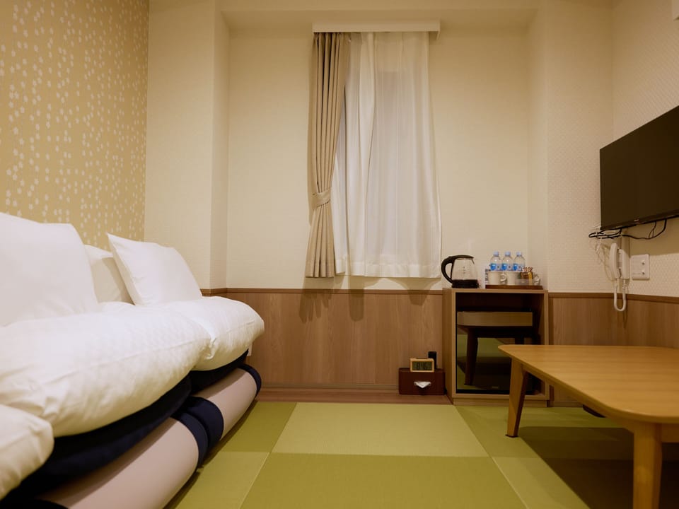 Basic Triple Room, Non Smoking | Desk, laptop workspace, blackout drapes, iron/ironing board