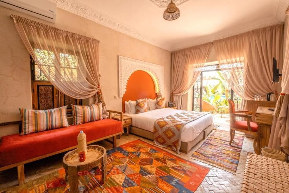 Premium Suite, 1 King Bed, Terrace, Pool View | Premium bedding, memory foam beds, minibar, in-room safe