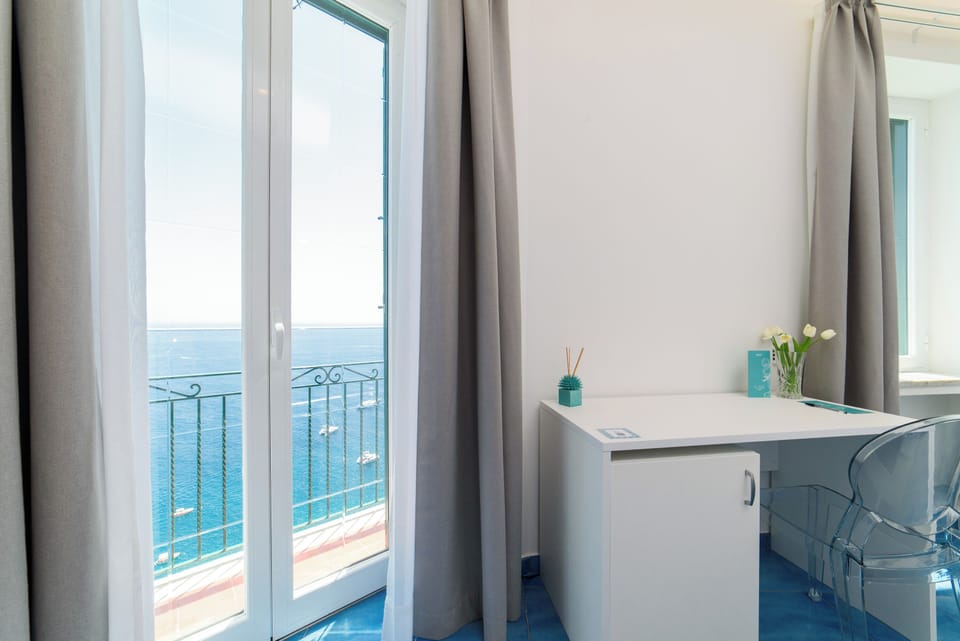 Deluxe Room, 1 Queen Bed, Balcony, Sea Facing | 1 bedroom, premium bedding, memory foam beds, minibar