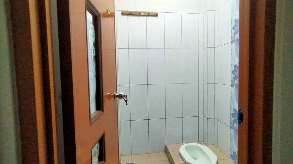 Deluxe Room | Bathroom | Towels