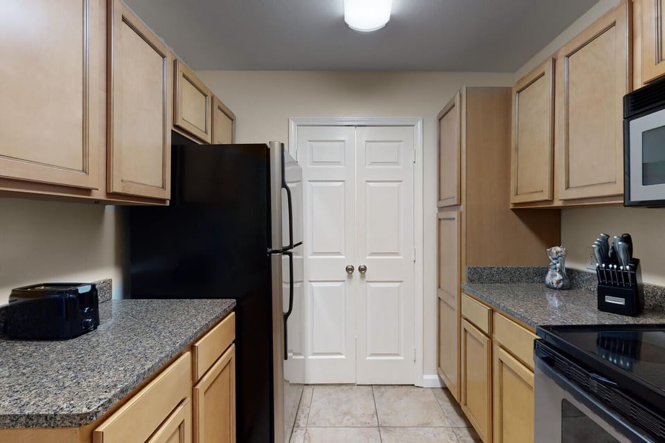 Condo, Multiple Beds, Balcony, Garden View | Private kitchen | Fridge, microwave, oven, stovetop
