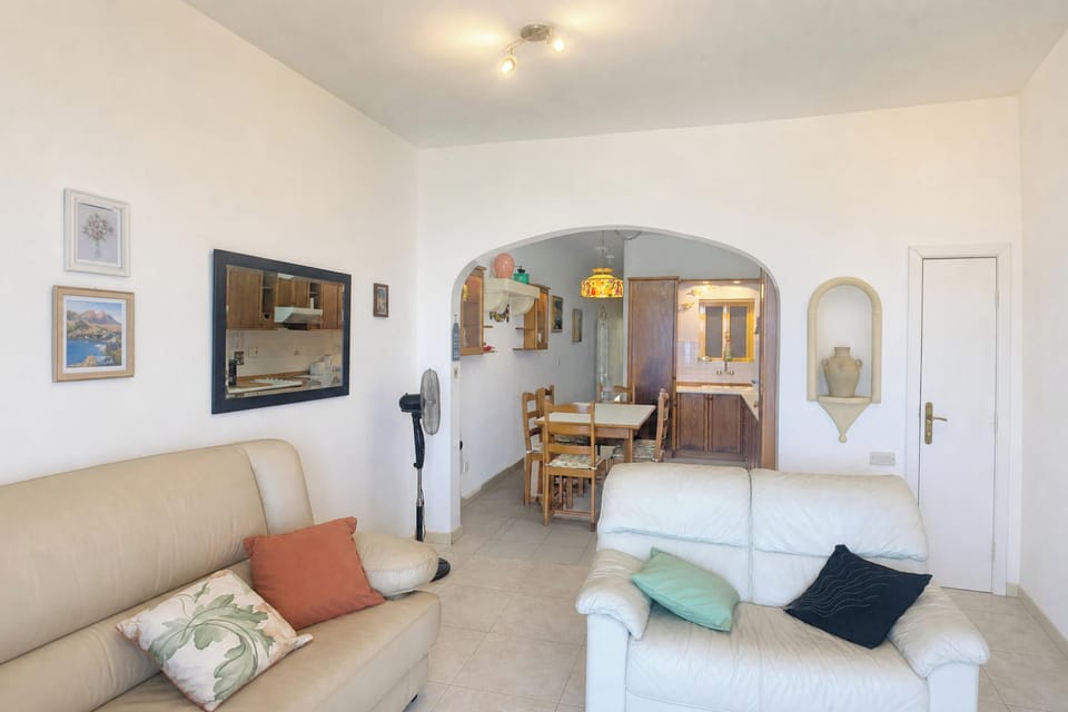 Family Apartment, 2 Bedrooms, Balcony (Seafront apartment in Gozo,) | Living area | TV
