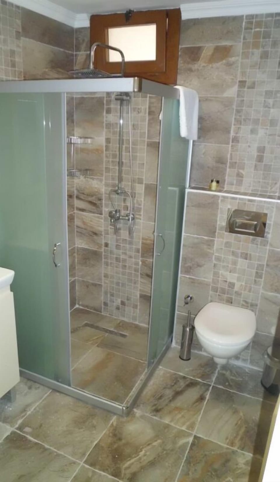 Shower, free toiletries, hair dryer, slippers
