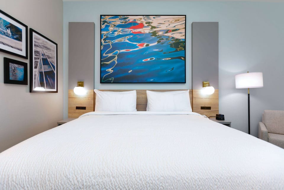 Pillowtop beds, desk, laptop workspace, free WiFi