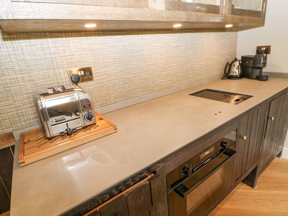 Fridge, electric kettle, toaster, cookware/dishes/utensils