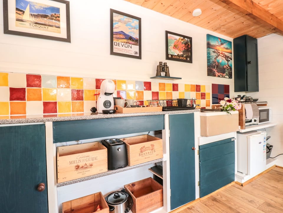 Fridge, electric kettle, toaster, cookware/dishes/utensils