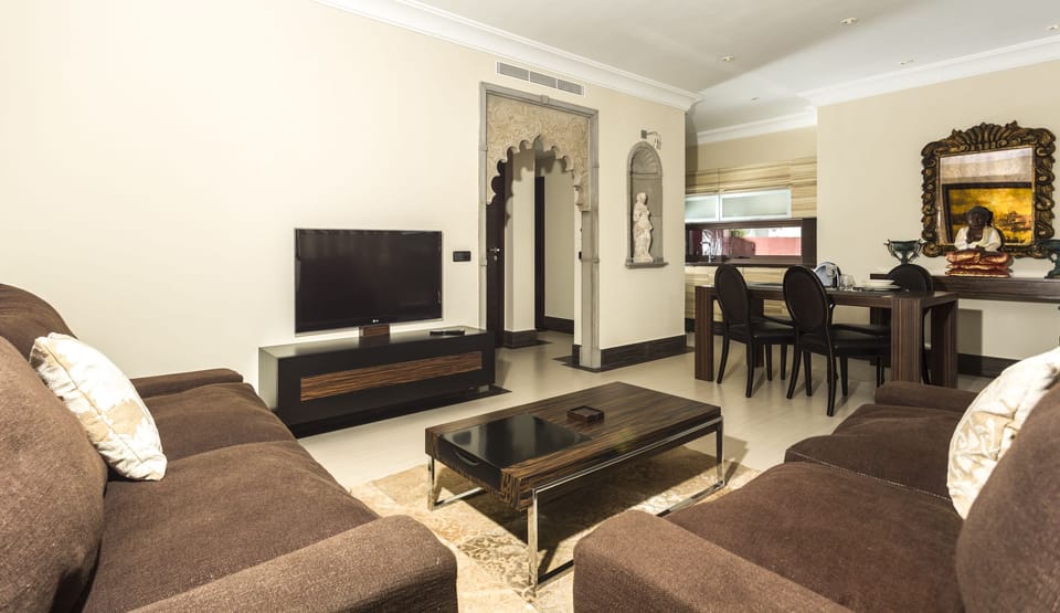 Luxury Apartment, 1 Bedroom | Living area | 28-inch Smart TV with digital channels, TV