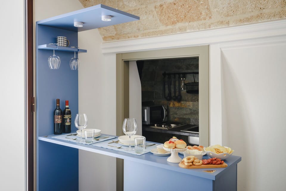 Superior Suite | Private kitchen | Full-size fridge, espresso maker, coffee/tea maker, electric kettle