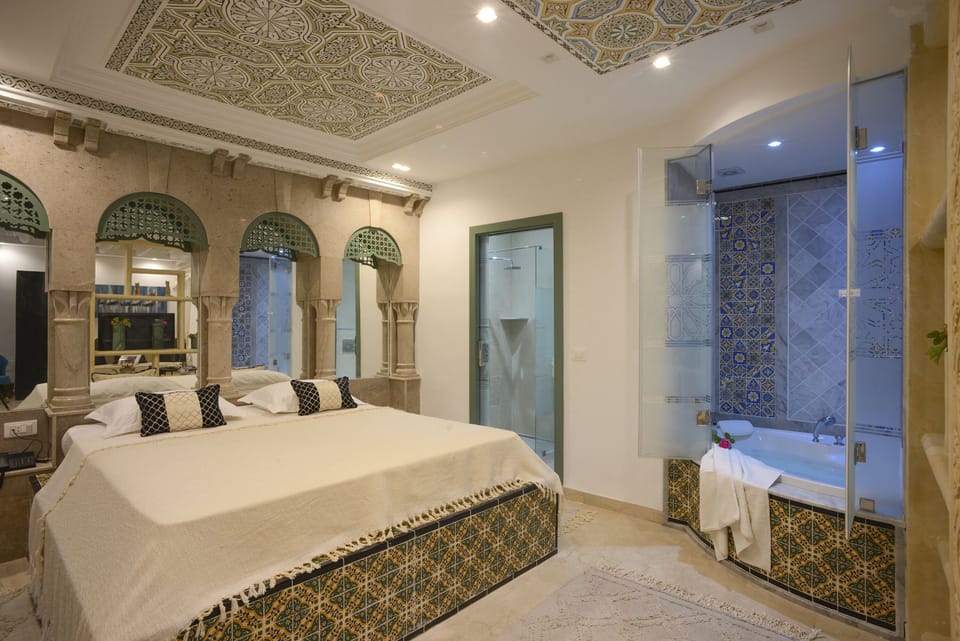 Royal Suite, Multiple Beds, Non Smoking | Bathroom | Separate tub and shower, deep soaking tub, towels, soap