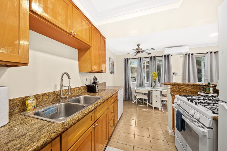 Comfort Apartment | Private kitchen | Full-size fridge, microwave, oven, stovetop