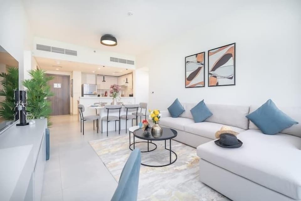 Superior Apartment | Living area | 65-inch Smart TV with cable channels