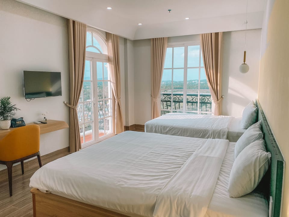 Premier Quadruple Room, Balcony, Beach View | Egyptian cotton sheets, premium bedding, down comforters