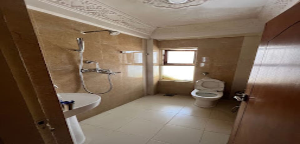 Shower, rainfall showerhead, towels, soap