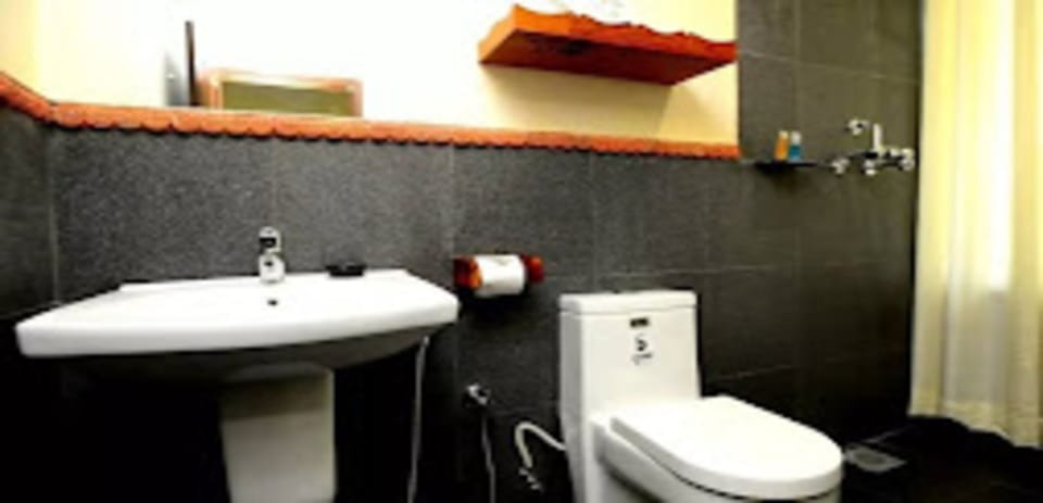 Shower, rainfall showerhead, towels, soap