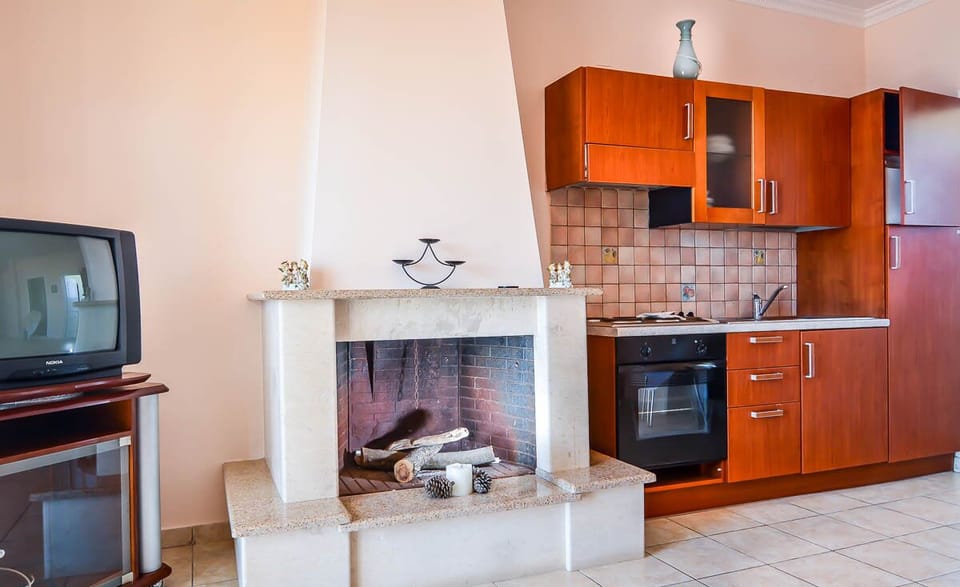 Family Apartment, 2 Bedrooms, Sea View, Beachfront | Living area | Flat-screen TV